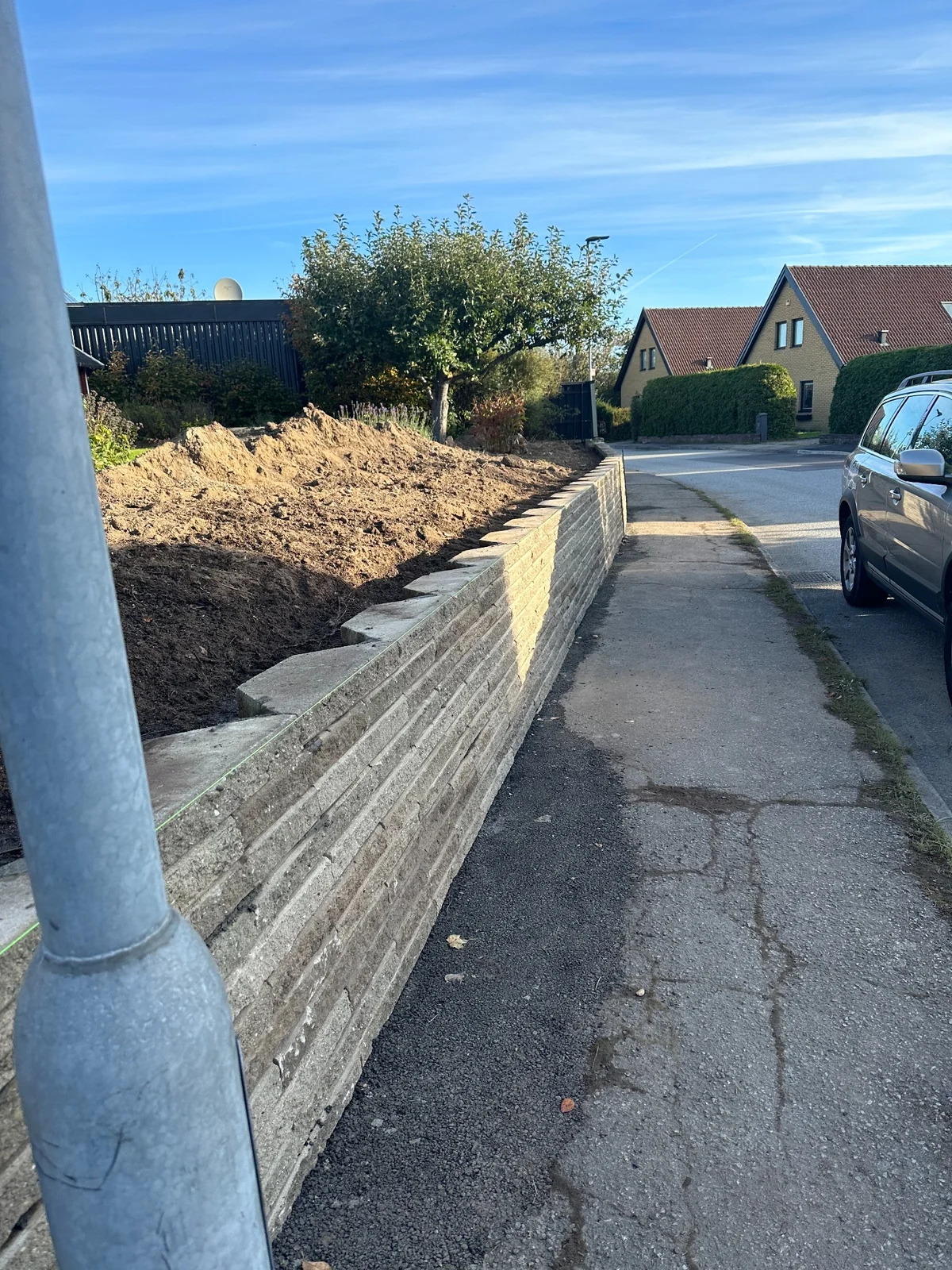 Residential retaining wall during project